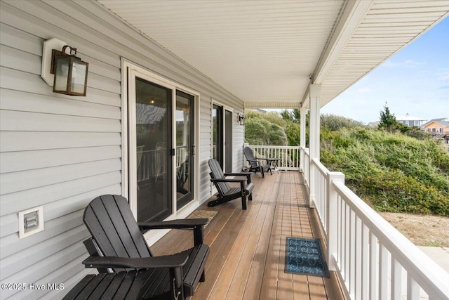 220 W Dolphin Dr, Oak Island, NC 28465 - view of wooden deck