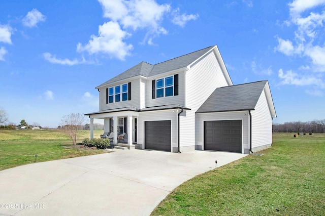 view of front of house with a front yard and driveway