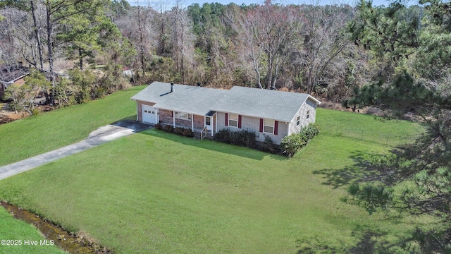 aerial view featuring a view of trees