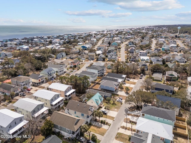 bird's eye view featuring a residential view and a water view