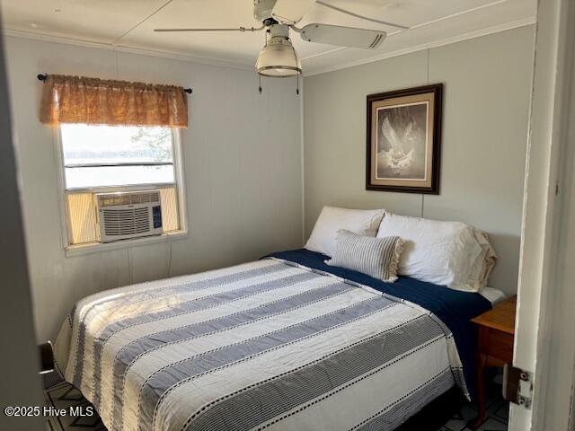 bedroom with cooling unit, a ceiling fan, and crown molding