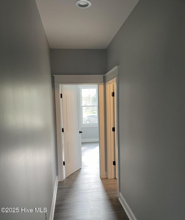305 Pine Knoll Cir, Pine Knoll Shores, NC 28512 - corridor with baseboards and dark wood finished floors