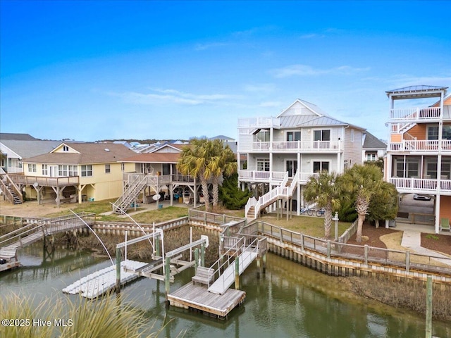 view of dock with a water view and stairway