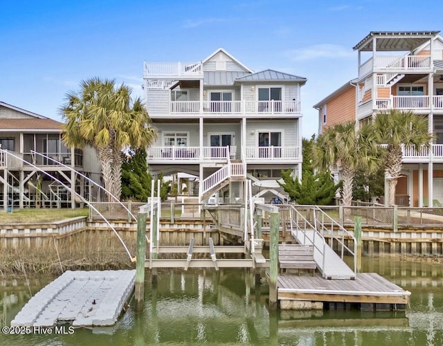 dock area with a water view
