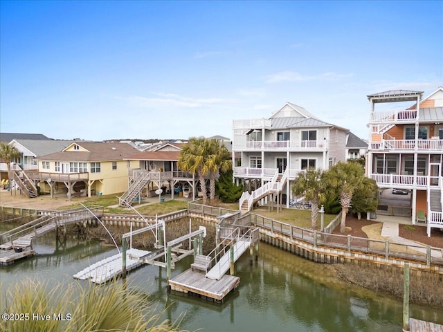 view of dock with a water view and stairway