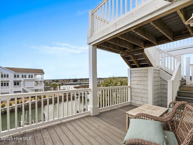 wooden deck featuring stairs