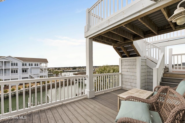 deck featuring stairway