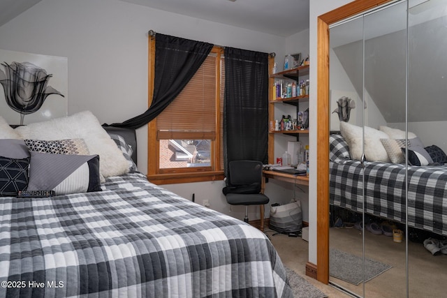 carpeted bedroom featuring a closet