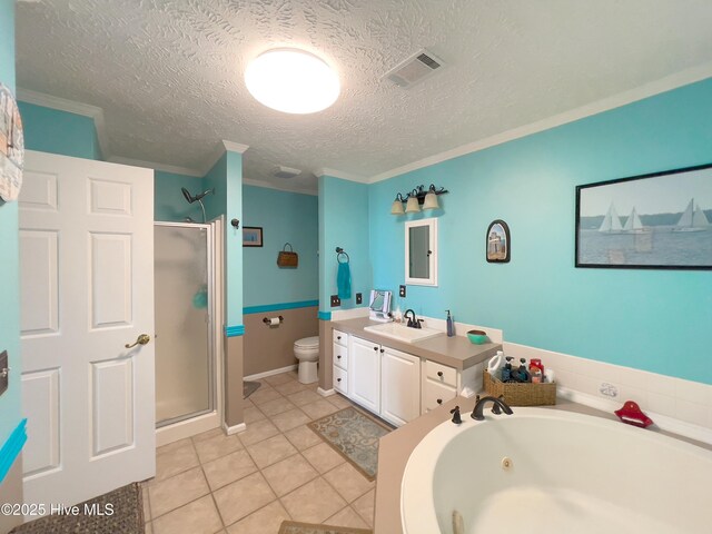 interior space featuring light tile patterned floors, baseboards, and a textured ceiling