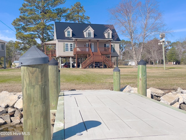 exterior space featuring stairway and a lawn