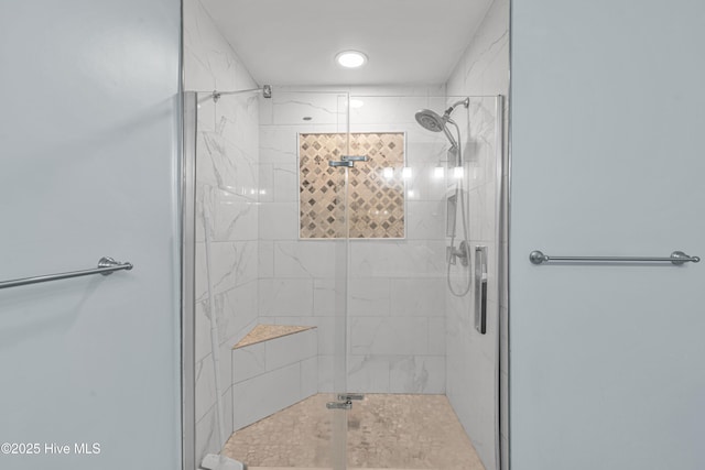 bathroom with a stall shower