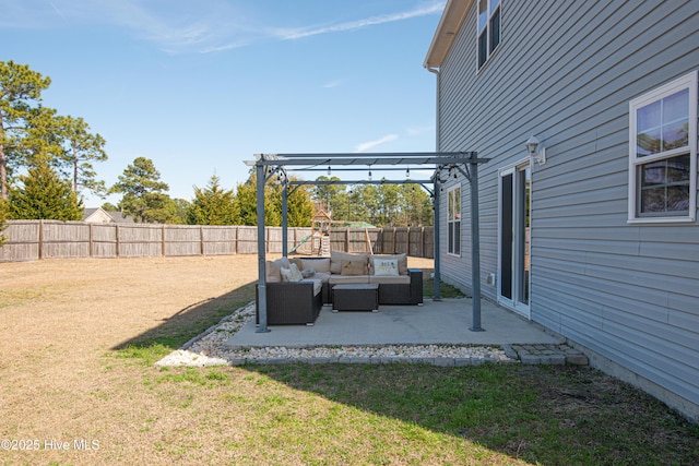 view of yard featuring a patio area, a fenced backyard, an outdoor living space, and a pergola