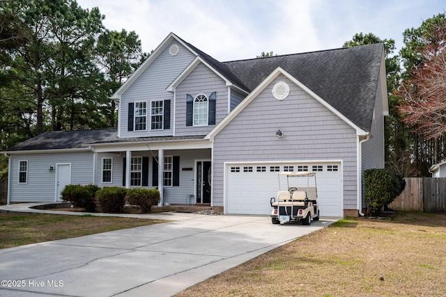 traditional-style home with driveway, an attached garage, fence, a porch, and a front yard