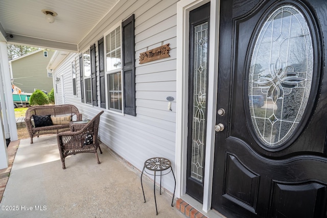 entrance to property with a porch