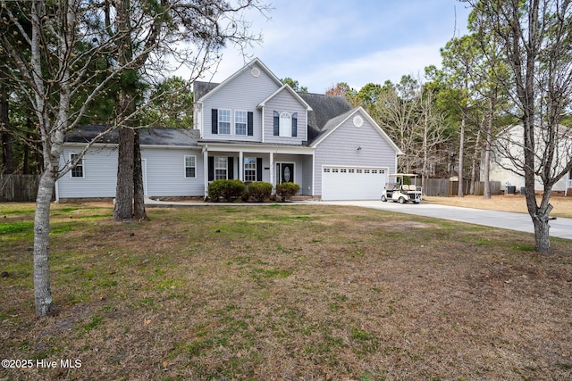 traditional home featuring covered porch, a front yard, fence, a garage, and driveway