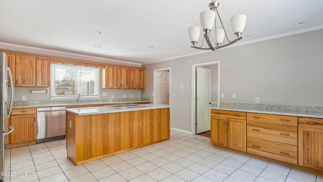 kitchen with light tile patterned floors, appliances with stainless steel finishes, light stone counters, a center island, and a sink