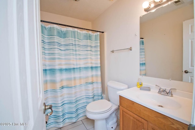 bathroom featuring visible vents, toilet, a shower with shower curtain, tile patterned flooring, and vanity