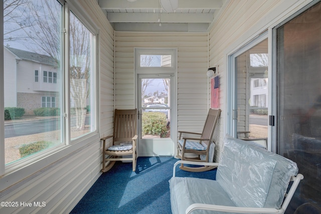 sunroom / solarium with beam ceiling