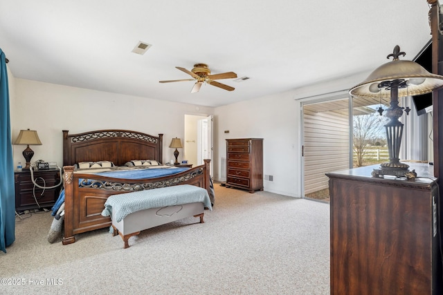 bedroom with visible vents, carpet floors, a ceiling fan, and access to outside