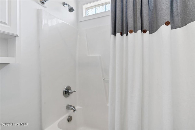 full bath featuring shower / bathtub combination with curtain