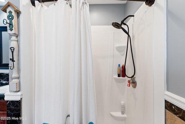 full bathroom featuring a shower with curtain