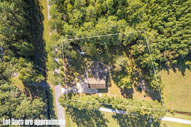 bird's eye view featuring a view of trees