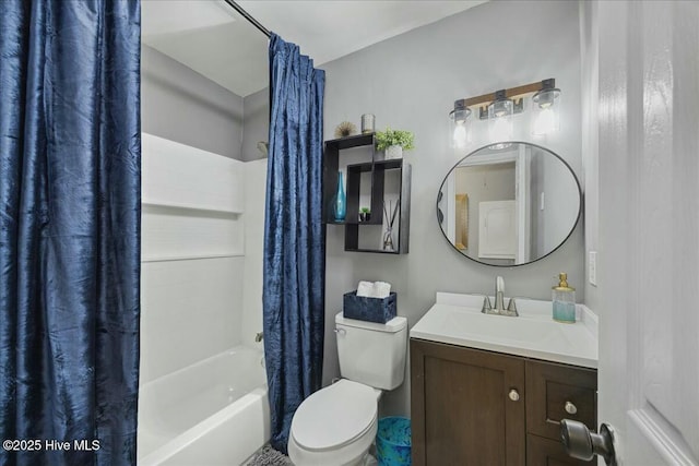 full bathroom featuring shower / bathtub combination with curtain, toilet, and vanity