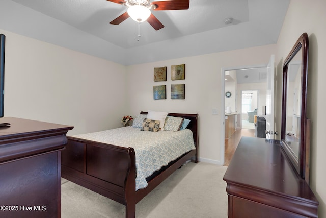 bedroom with baseboards, a ceiling fan, and light colored carpet