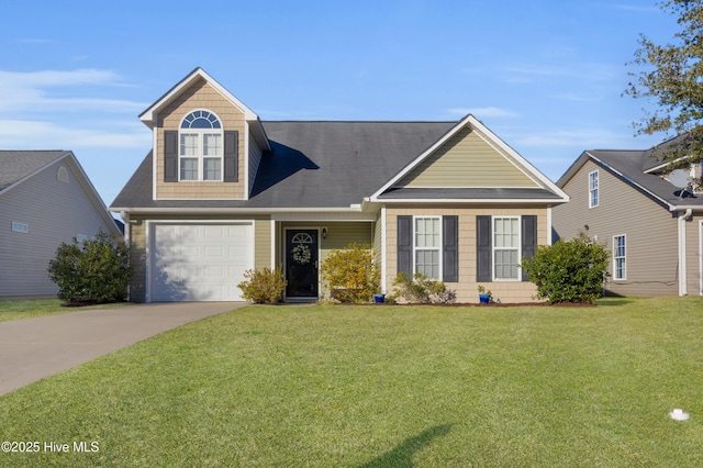 view of front of home featuring a front lawn and concrete driveway