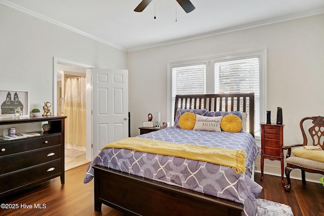 bedroom featuring ceiling fan, baseboards, wood finished floors, and crown molding