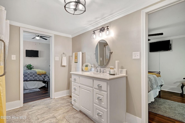 full bathroom with ensuite bath, ceiling fan, crown molding, and vanity