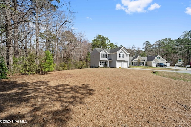 view of front of house with a garage and driveway