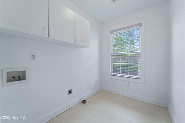 laundry area with cabinet space, baseboards, light floors, washer hookup, and electric dryer hookup