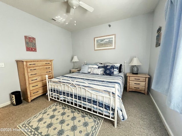 bedroom featuring carpet floors, a ceiling fan, visible vents, and baseboards