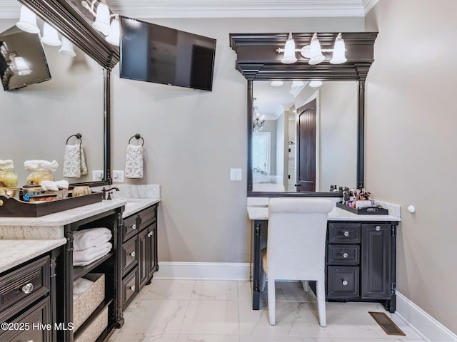 bathroom featuring baseboards, marble finish floor, ornamental molding, and vanity