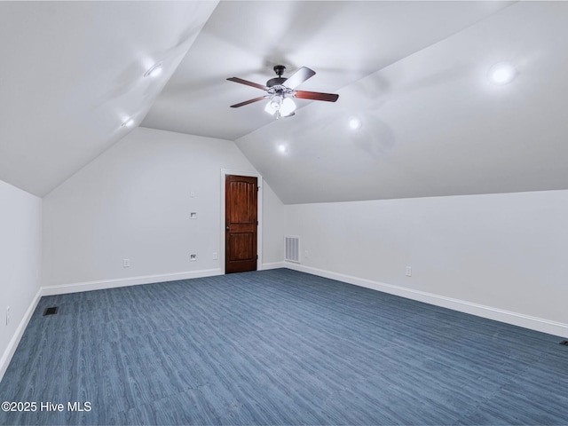 bonus room with visible vents, lofted ceiling, baseboards, and ceiling fan