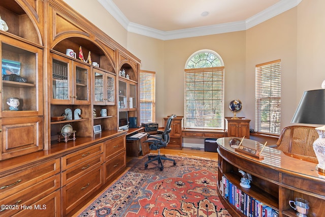 2760 Marsh Point Ln SE, Southport, NC 28461 - office with crown molding, wood finished floors, and built in study area