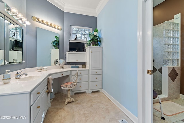 full bath featuring crown molding, walk in shower, vanity, and tile patterned floors