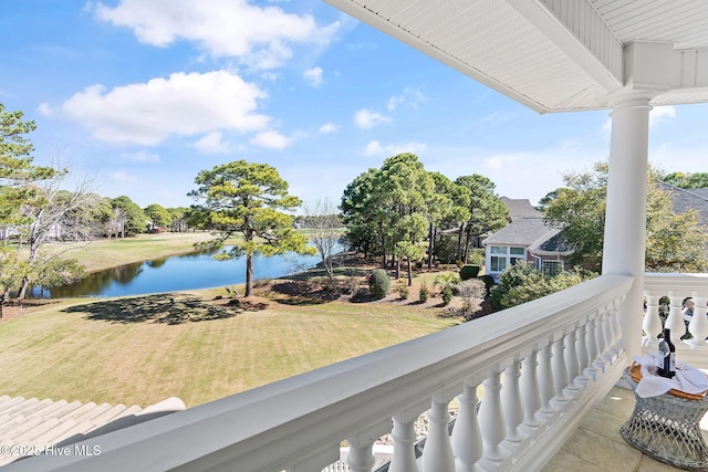 balcony featuring a water view