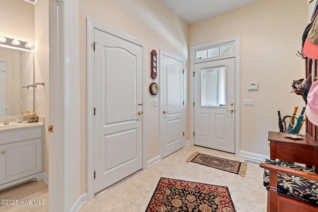 2760 Marsh Point Ln SE, Southport, NC 28461 - entrance foyer with baseboards