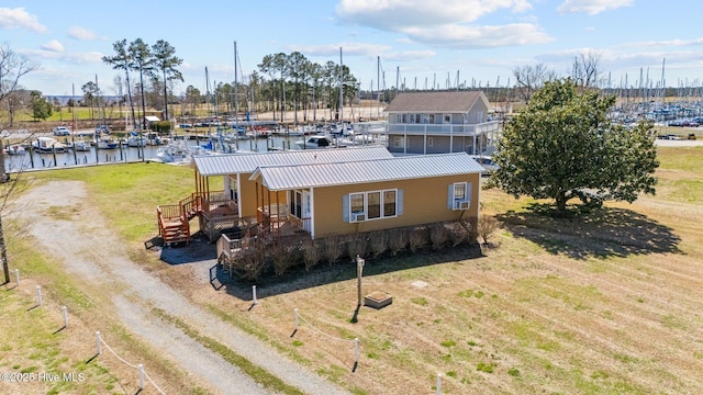 drone / aerial view featuring a water view