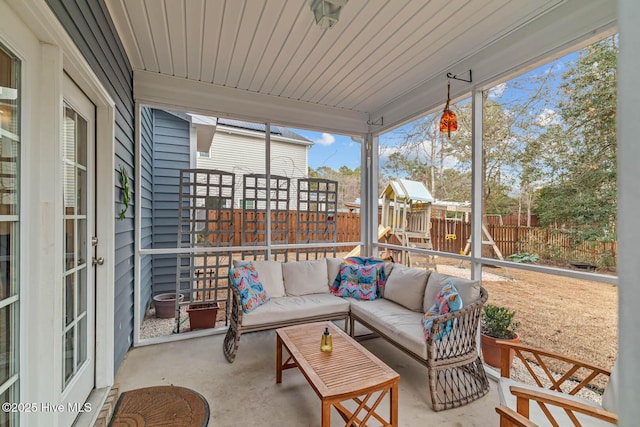 sunroom with wooden ceiling