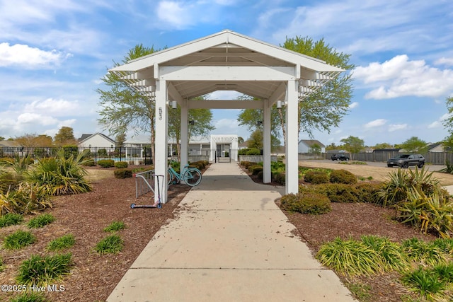 view of community with fence and a gazebo