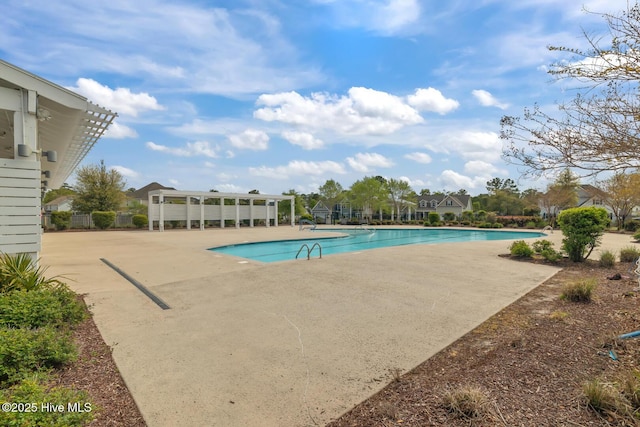 community pool featuring a patio