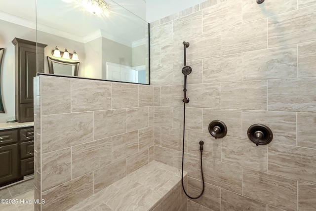 full bathroom featuring crown molding, vanity, and a walk in shower