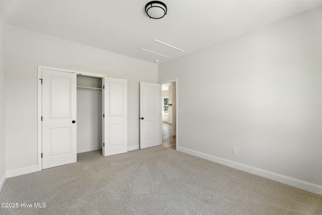 4506 Fairhaven Dr W, Wilson, NC 27893 - unfurnished bedroom featuring carpet, attic access, and a closet