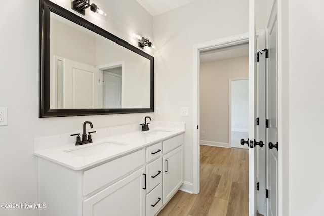 4506 Fairhaven Dr W, Wilson, NC 27893 - bathroom with double vanity and wood finished floors