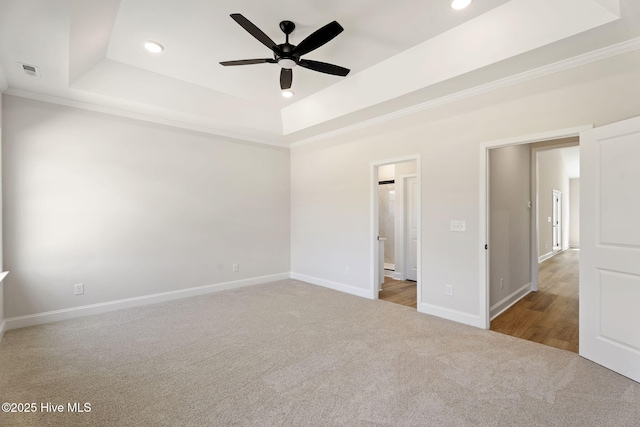 4506 Fairhaven Dr W, Wilson, NC 27893 - unfurnished bedroom with a raised ceiling, carpet floors, crown molding, recessed lighting, and a ceiling fan