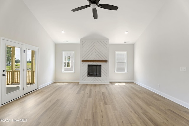 4506 Fairhaven Dr W, Wilson, NC 27893 - unfurnished living room with healthy amount of natural light, light wood-style floors, and a ceiling fan