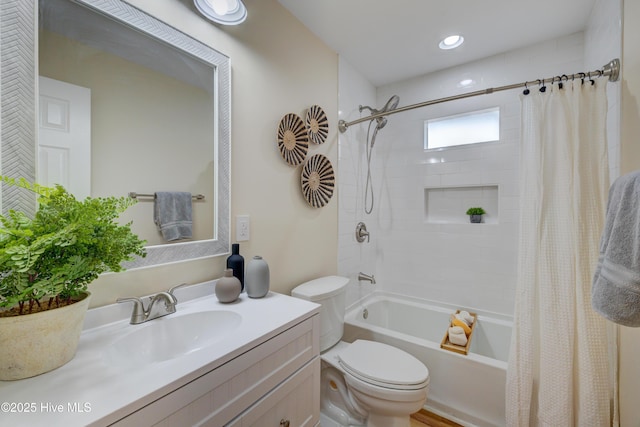 bathroom featuring recessed lighting, vanity, toilet, and shower / bathtub combination with curtain